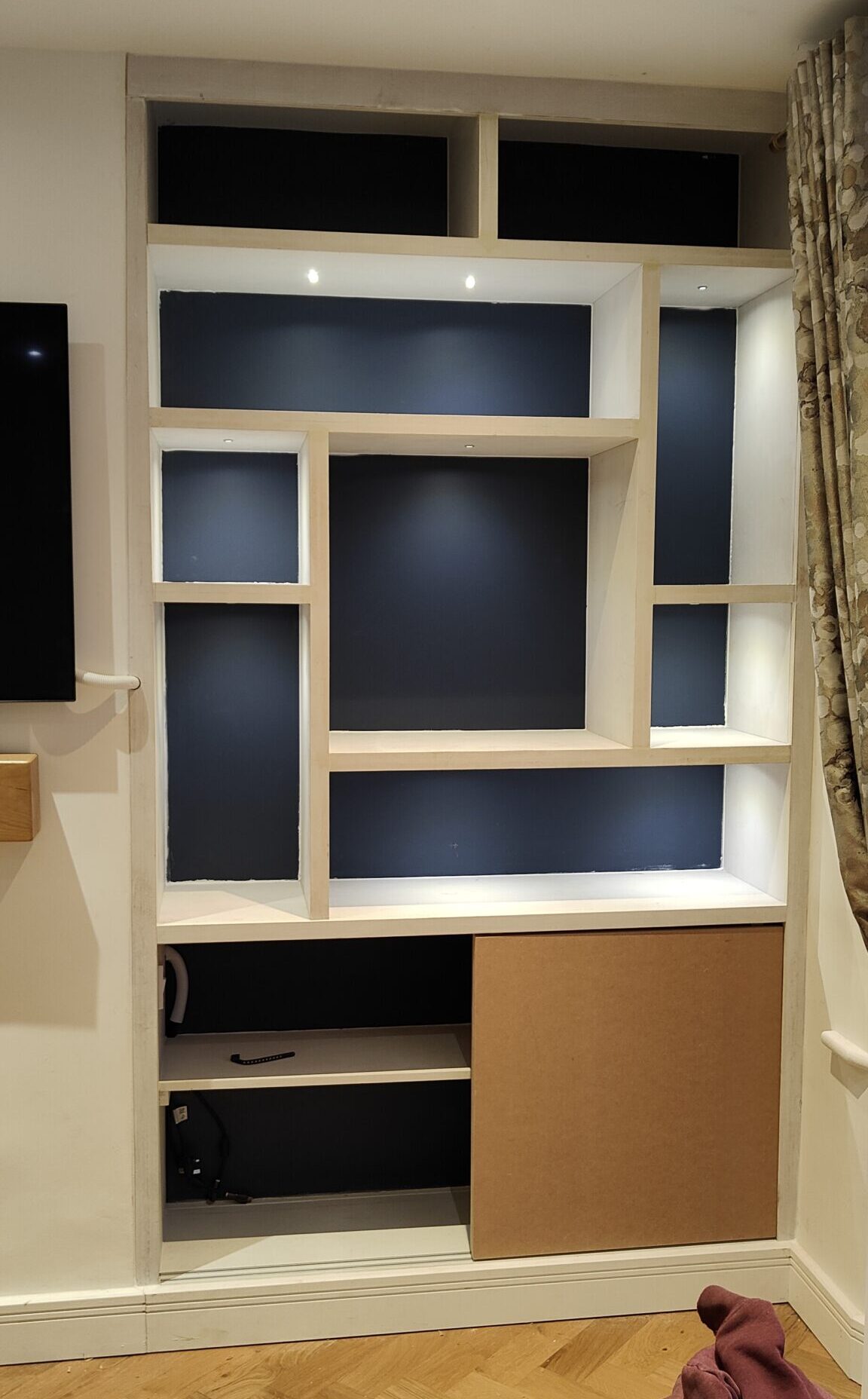 Bespoke personalised products, and courses - Shelving unit built in with lights